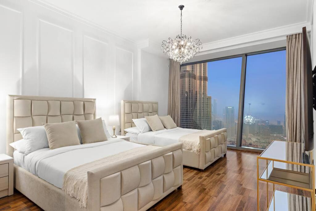 4br Downtown With Burj View Pool Gym And Free Parking Apartment *